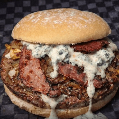 Hamburguesa con cheddar y vegetales