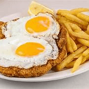Breaded steak with fried egg