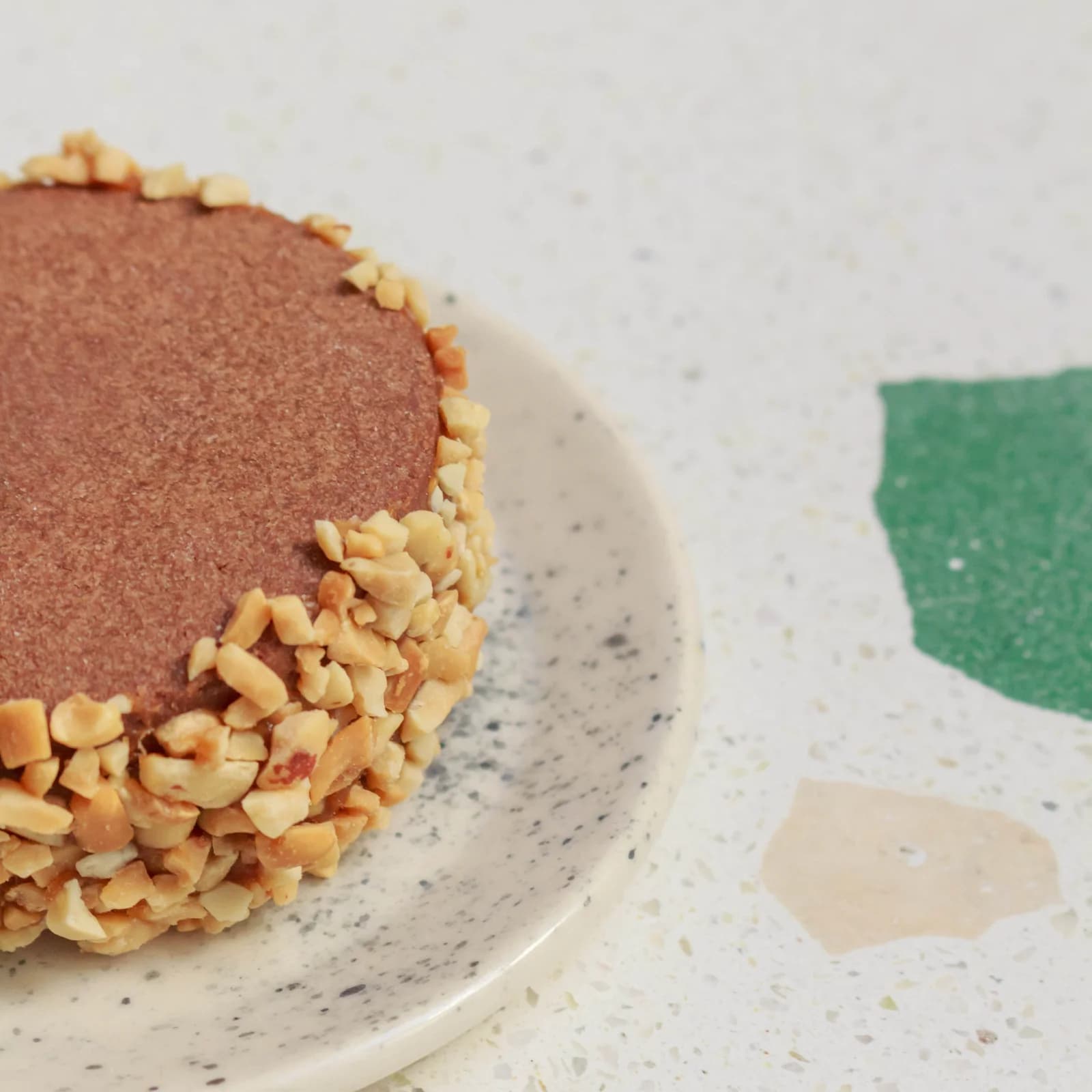 Alfajor de choco, dulce de leche y mani