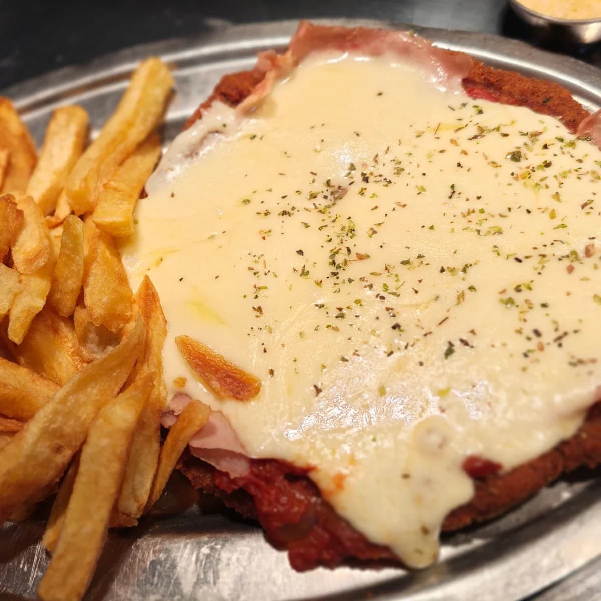 Milanesa napolitana con papas